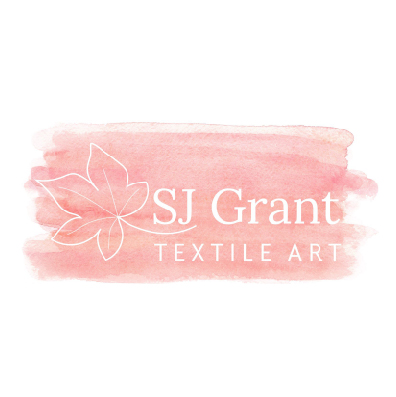 SJGTA logo in white on textured pink background